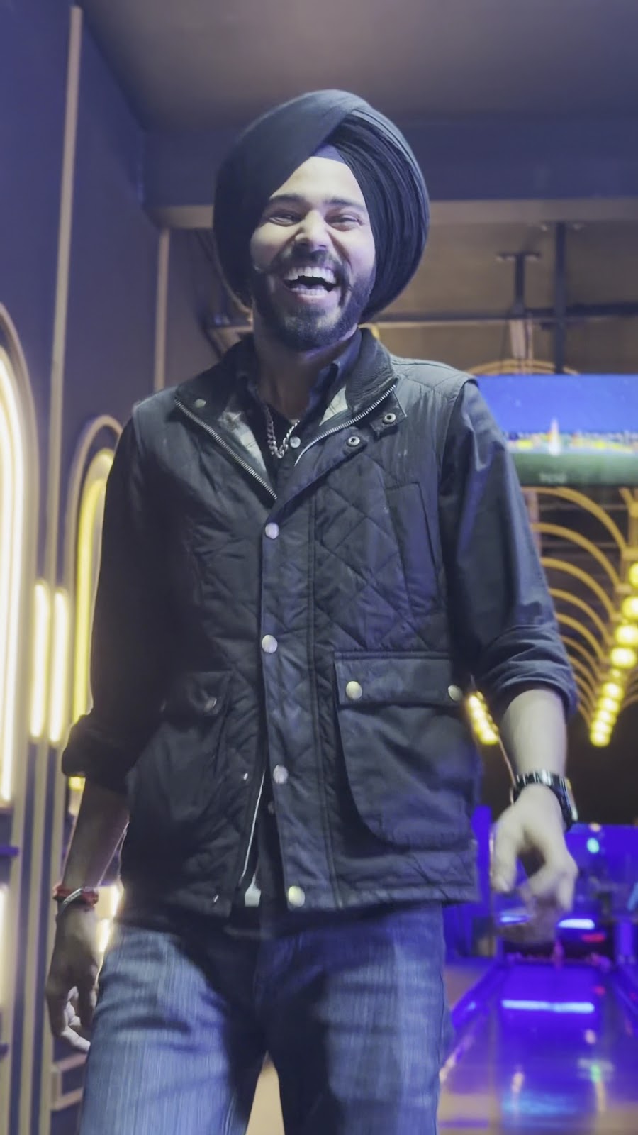 Player celebrating a strike at Wopper bowling