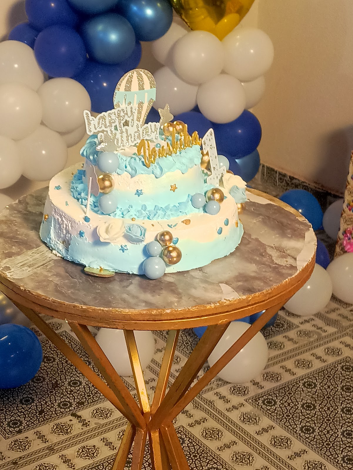 Birthday celebration cake and balloons at Wopper