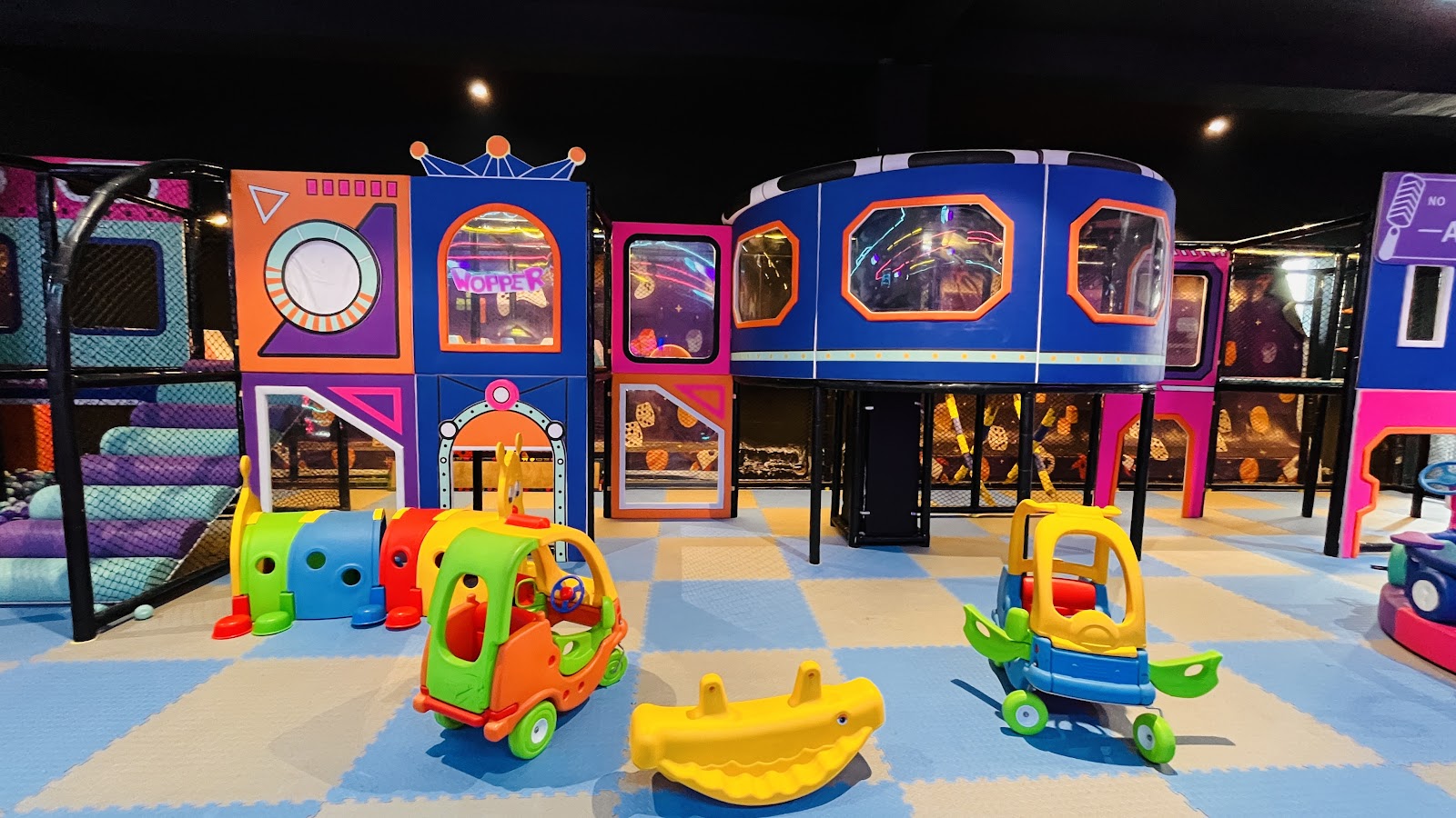 Soft play castle and obstacle maze with Wopper sign